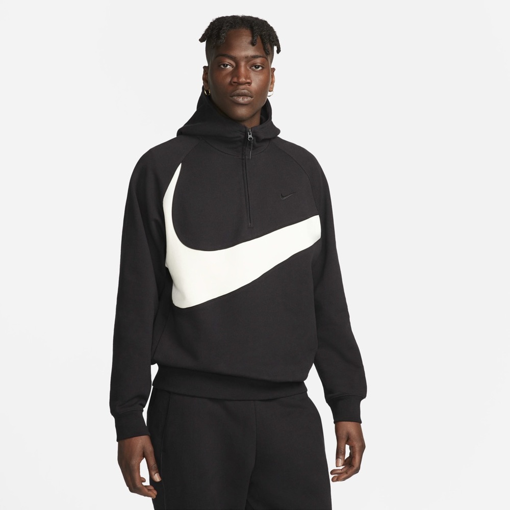 Nike Swoosh Men's 1/2-Zip Fleece Hoodie designed with a large contrast swoosh